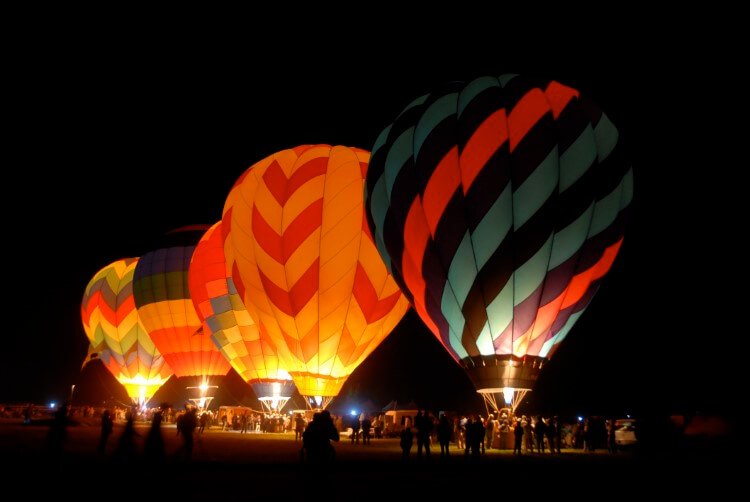 A hot air balloon showcase that shines at night.