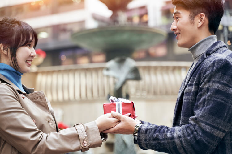 Japanese women giving gifts to men